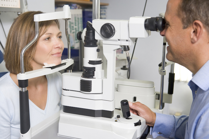 woman receiving emergency eye care from her optometrist